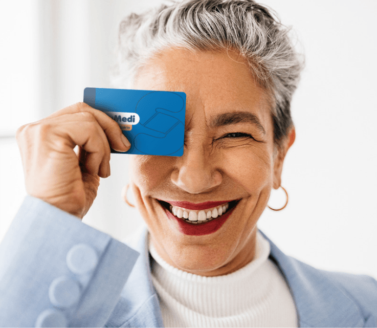 Woman handling a Solumedi in front of her face.